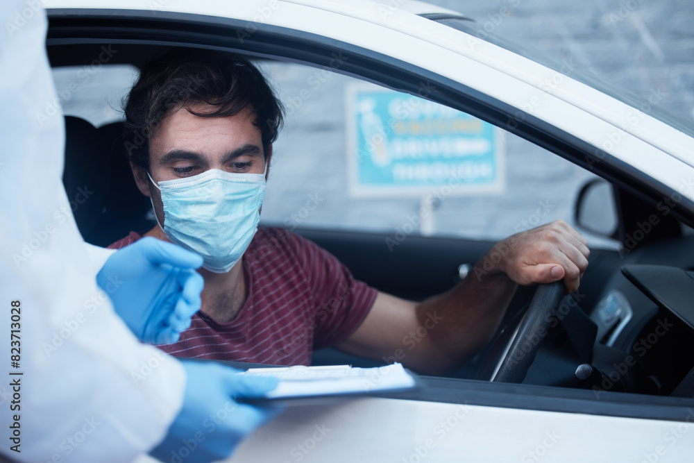 Car, man and drive through for checklist with doctor for inspection, face mask and questions for disease screening. Male person, health worker and protective suit with clipboard for contact tracing. Car, man and drive through for checklist with doctor for inspection, face mask and questions for disease screening. Male person, health worker and protective suit with clipboard for contact tracing.