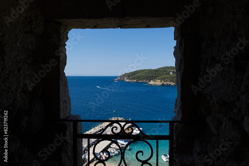 glimpse of the Tremiti islands from a window. Puglia, Italy.