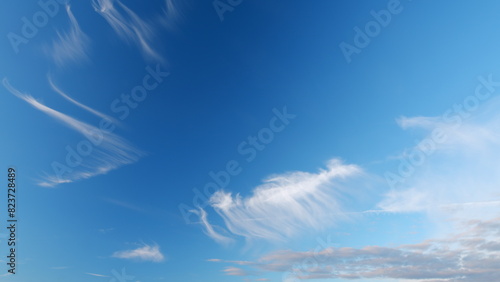 Sky after the storm. Majestic amazing blue sky with cirrus clouds. Nature clouds moving. Timelapse. photo