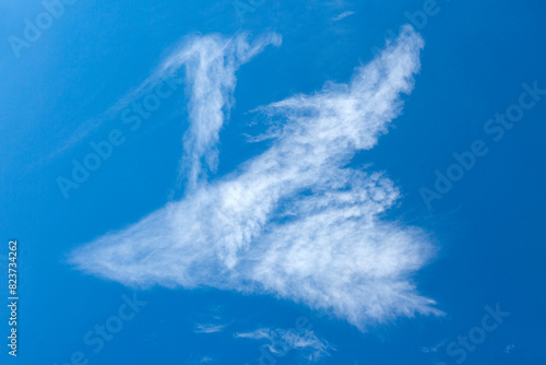 Blue sky with sunlight and beautiful white clouds.