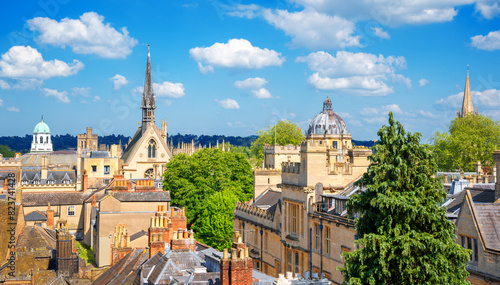 Top cityscape view of the city of Oxford with historical traditional architecture, bell towers and church steeples, typical of the university city on a sunny day