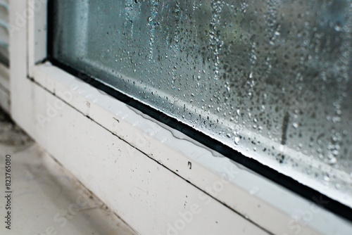 condensate. wet window glass due to high humidity photo