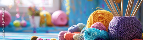 Colorful Knitting Supplies on Table with Softly Blurred Background