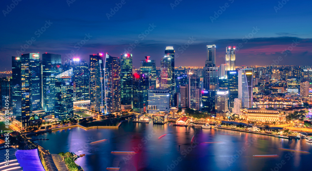 Singapore Skyline and view of skyscrapers on Marina Bay at sunset. Singapore Skyline and view of skyscrapers on Marina Bay at sunset.