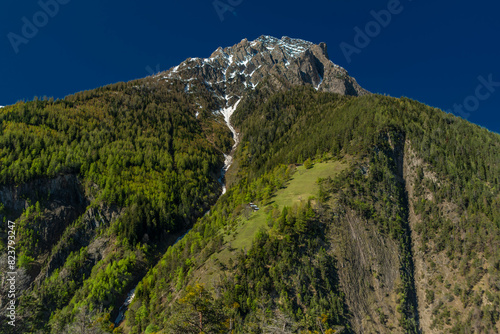 Fotografia Glishorn and Fulhorn hills near Brig town in spring fresh morning