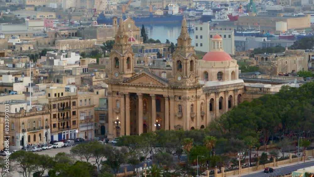 St. Publius Parish Church in Floriana city, Malta island. Closeup drone view St. Publius Parish Church in Floriana city, Malta island. Closeup drone view