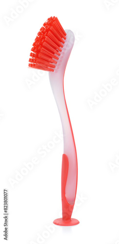 Red plastic dish scrubber brush with suction cup