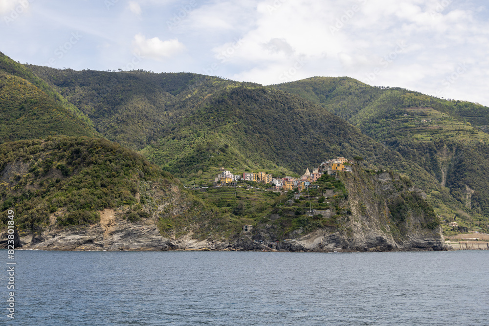 view of a mountain from the water in cinque-terre in italy view of a mountain from the water in cinque-terre in italy