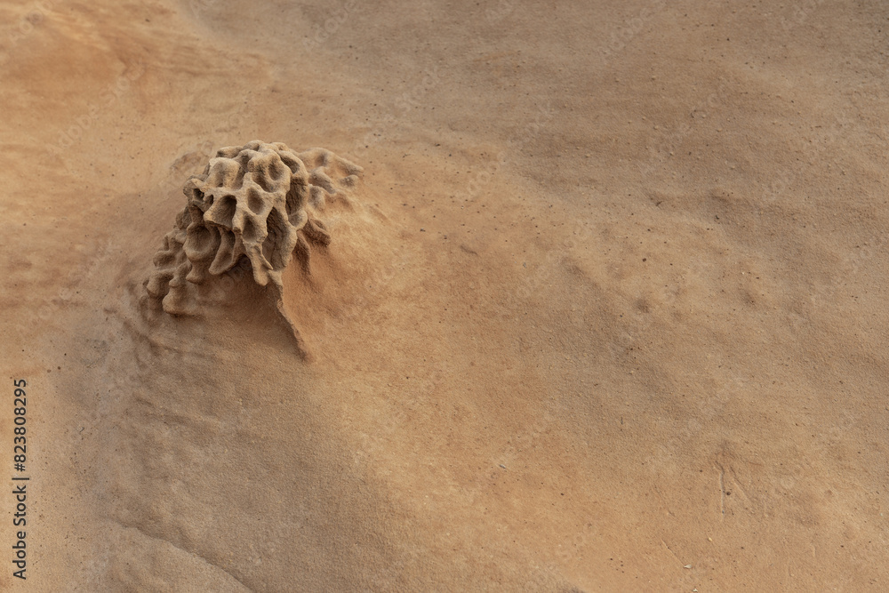 Obraz premium Sandstone Formation with Honeycomb Weathering