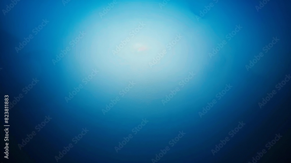 Obraz premium Serene Gradient Background Transitioning from Deep Blue to Light Blue for Design Projects