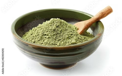 Green Matcha Powder in Ceramic Bowl with Wooden Spoon