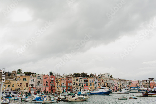 View from the shore. Coast of Procida Island  Italy. Old historic Italian architecture. Traditional European old town buildings. Vacation travel background