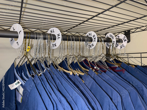 Uniforms coathanger  size on Coat Hangers in closet  photo