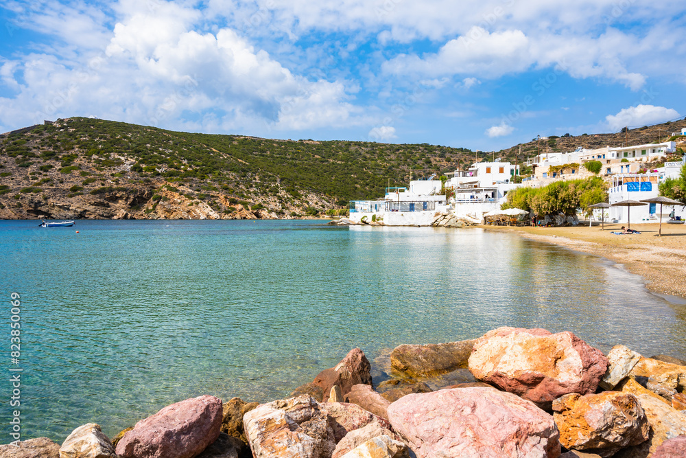 Fototapeta premium Rocks on beautiful beach in Faros village, Sifnos island, Greece