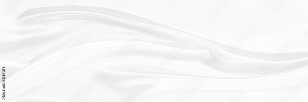 White gray satin texture that is white silver fabric silk panorama background with beautiful soft blur pattern natural.