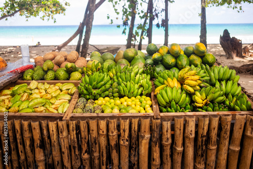 Exotic fruit selling on the beach photo