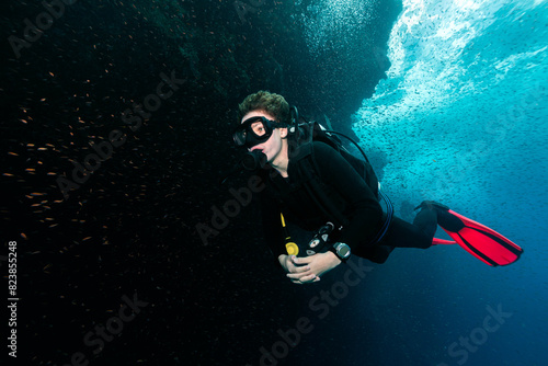 Portret of a gen-z boy scuba diving photo