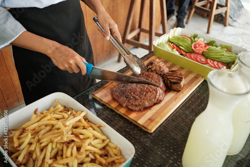 Slicing juicy Meat