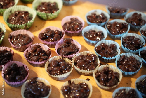 Photos Almonds with melted dark chocolate