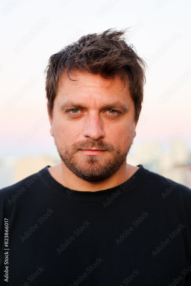 Portrait of confident green eyed man looking at the camera Portrait of confident green eyed man looking at the camera