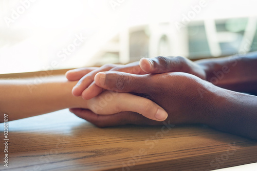 Holding hands, interracial and together for support, connection and trust in community with respect. Friends, people and empathy for relationship, kindness and praying for spiritual practice photo