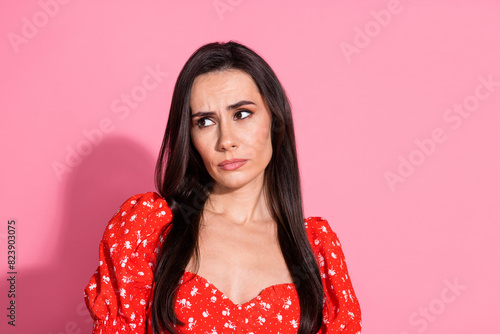 Photo portrait of hispanic beautiful young gorgeous lady in red glamour dress dissatisfied looking novelty isolated on pink color background © deagreez