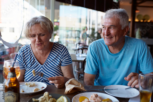 Portrait of a couple having lunch in a restaurant photo