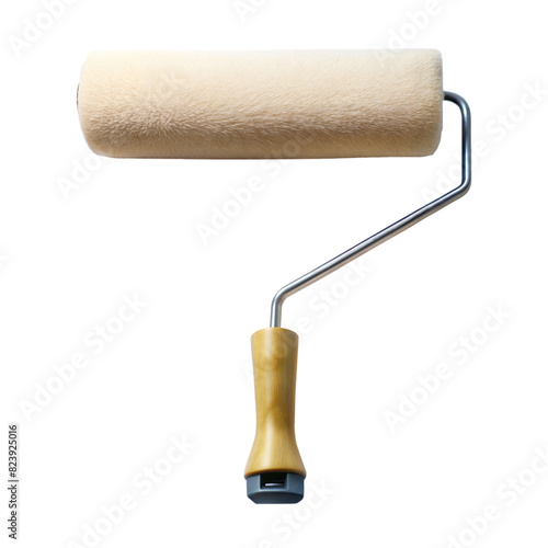 A white and tan paint roller with a wooden handle photo