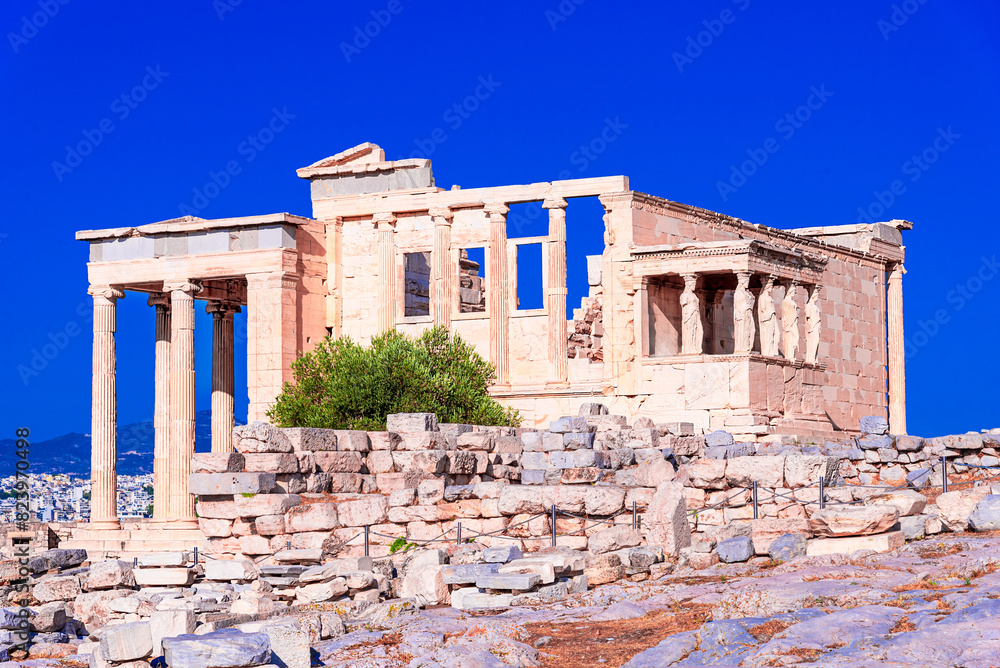 Fototapeta premium Athens, Greece: Temple of Erechtheion with the famous Six Caryatids or Karyatides at Porch on Acropolis, Europe