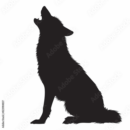 A wolf is sitting on the ground and has its mouth open photo