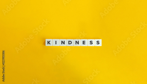 Kindness Word. Text on Block Letter Tiles on Flat Background. Minimalist Aesthetics.