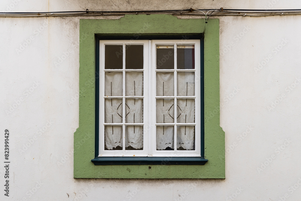 Green framed window on a building in Angra do Heroismo. Green framed window on a building in Angra do Heroismo.