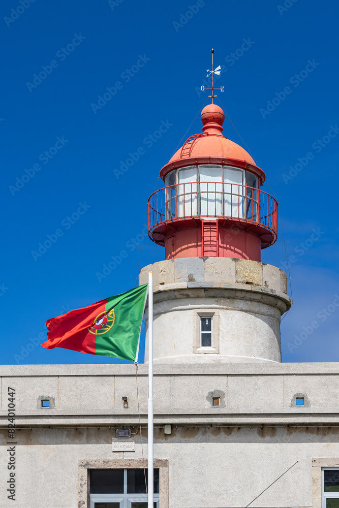 Portugese flag and Albarnaz Lighthouse on Flores Island. Portugese flag and Albarnaz Lighthouse on Flores Island.