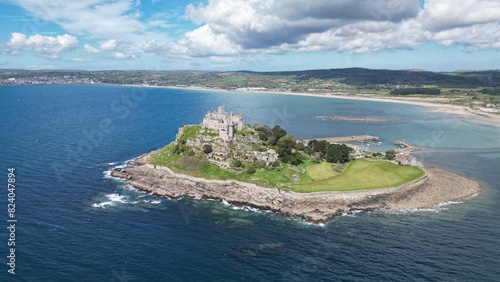 St Michael's Mount is a tidal island in Mount's Bay, Cornwall, England, United Kingdom. The island is a civil parish and is linked to the town of Marazion by a causeway of granite setts, passable bet photo