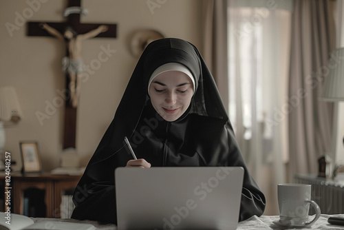 Woman In Nun Outfit Using Laptop photo