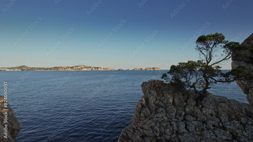 A View of a Body of Water From a Cliff A View of a Body of Water From a Cliff