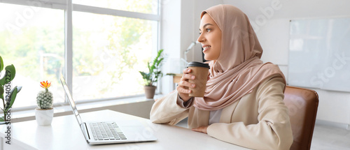 Pretty Muslim female progra...
