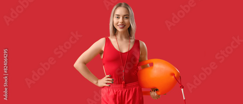 Female lifeguard with rescu...