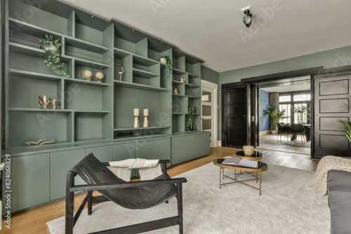 Modern living room with built-in shelving at Beethovenstraat 122-1