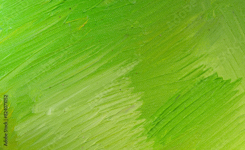 Fotografia A close-up view of a canvas with vibrant green paint applied in thick, textured