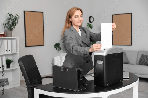 Adult secretary destroying ...