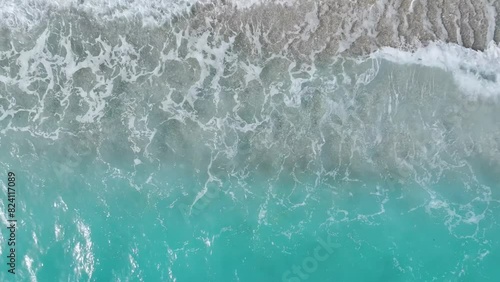 Top Down over Waves and Beach in Himare from a drone, Albanian Riviera, Albania photo