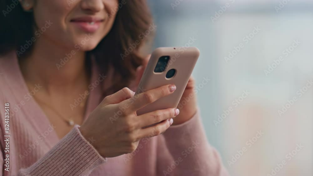 Joyful girl typing message sms in light flat closeup. Woman texting smartphone Joyful girl typing message sms in light flat closeup. Woman texting smartphone