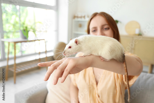 Young woman with cute white...
