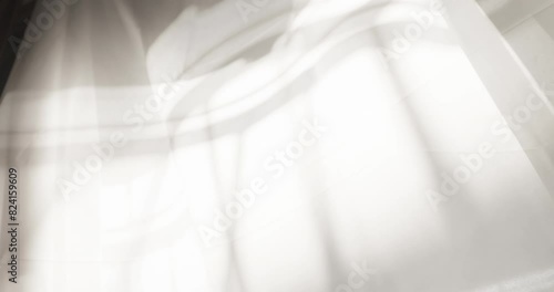 Translucent curtains on the windows while gently being blown by the wind., Slow motion
