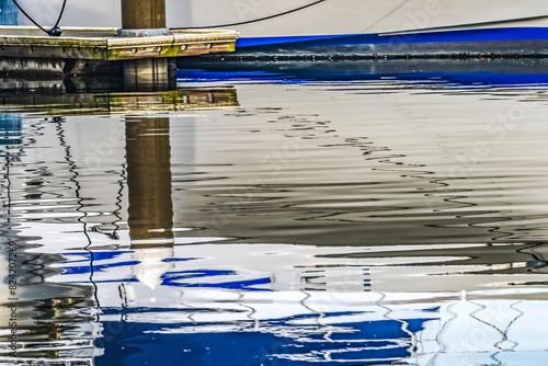 Sailboat reflection, Gig Harbor, Pierce County, Washington State. photo
