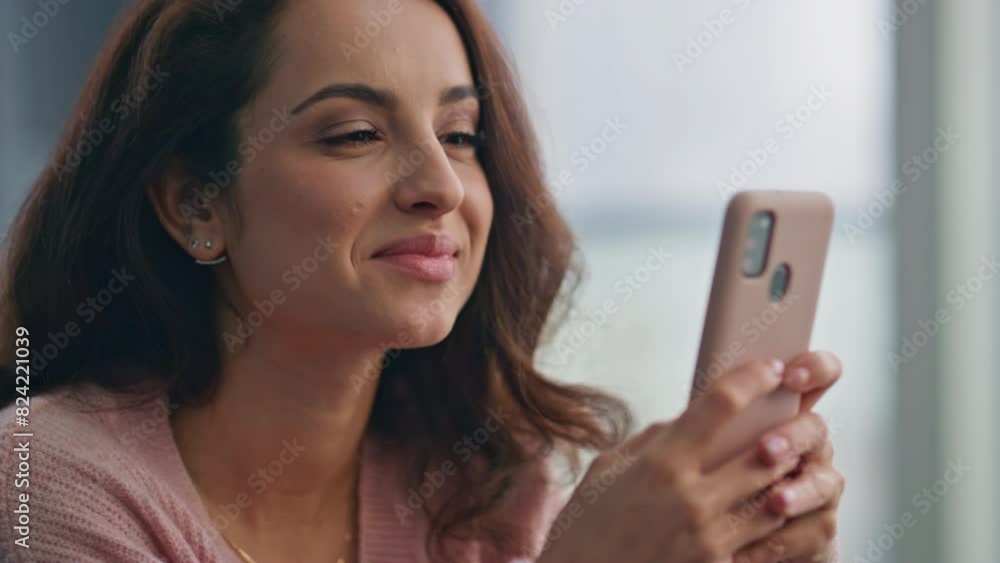 Laughing lady messaging cellphone at cozy house closeup. Smiling woman chatting