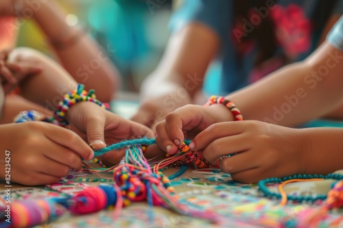 Children Hands Making Colorful Friendship Bracelets