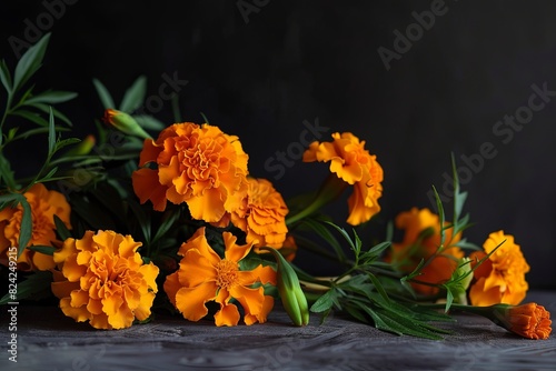 Still life arrangement depicting marigolds symbolizing life's phases. photo