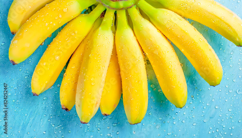 Image of multiple unpeeled banana bunches photo